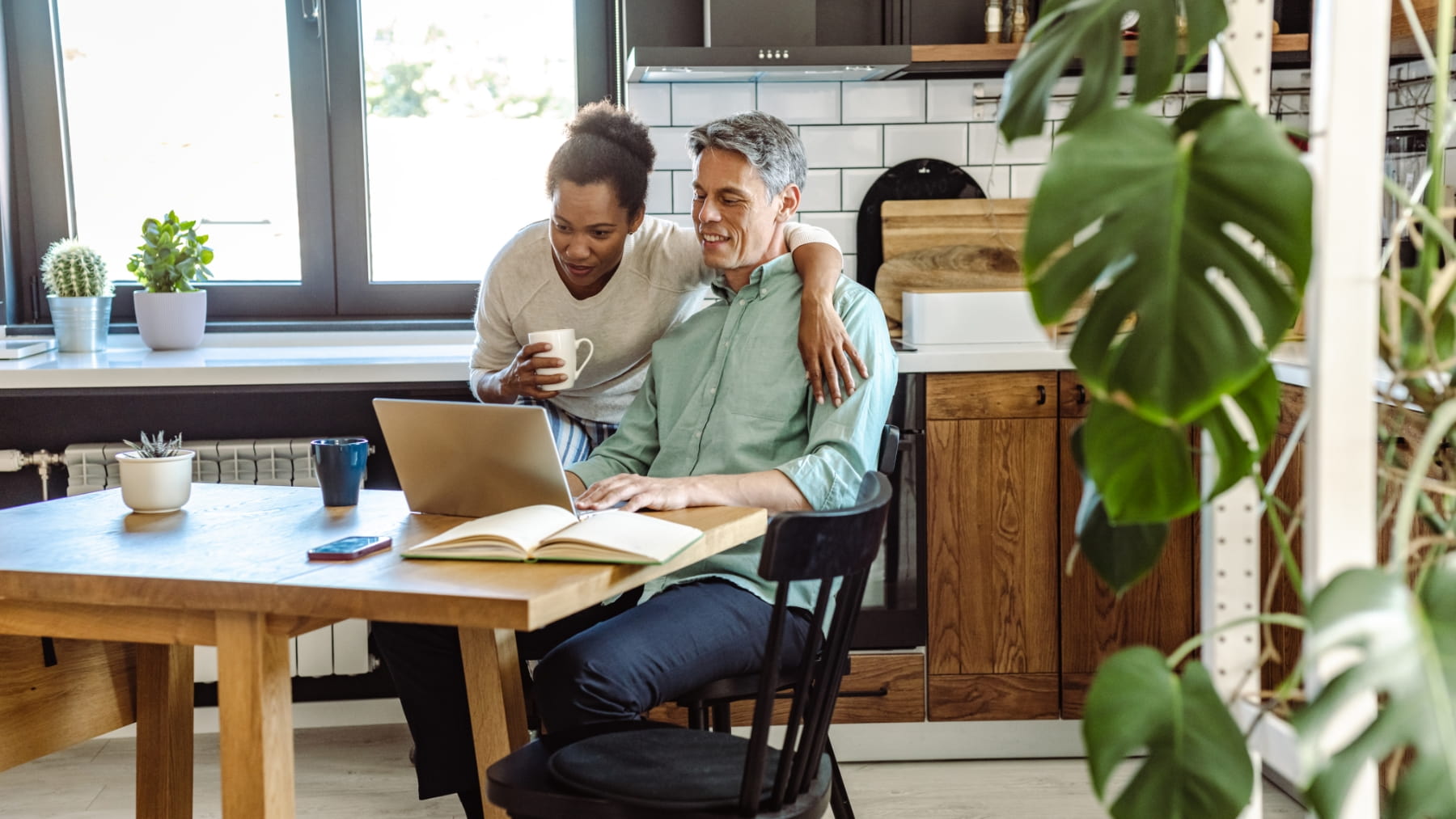 Couple in their kitchen during the day