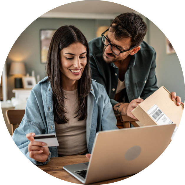 Couple looking at a computer to place an order