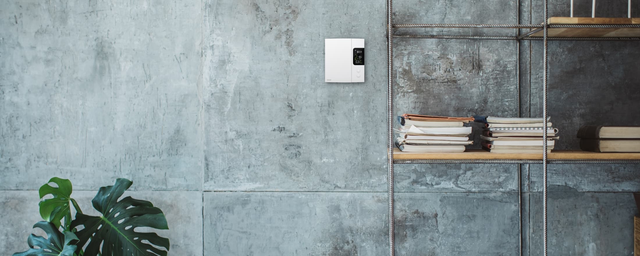 Thermostat Sinopé pour chauffage électrique au mur dans une pièce